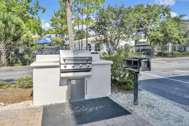 a view of a swimming pool with a yard