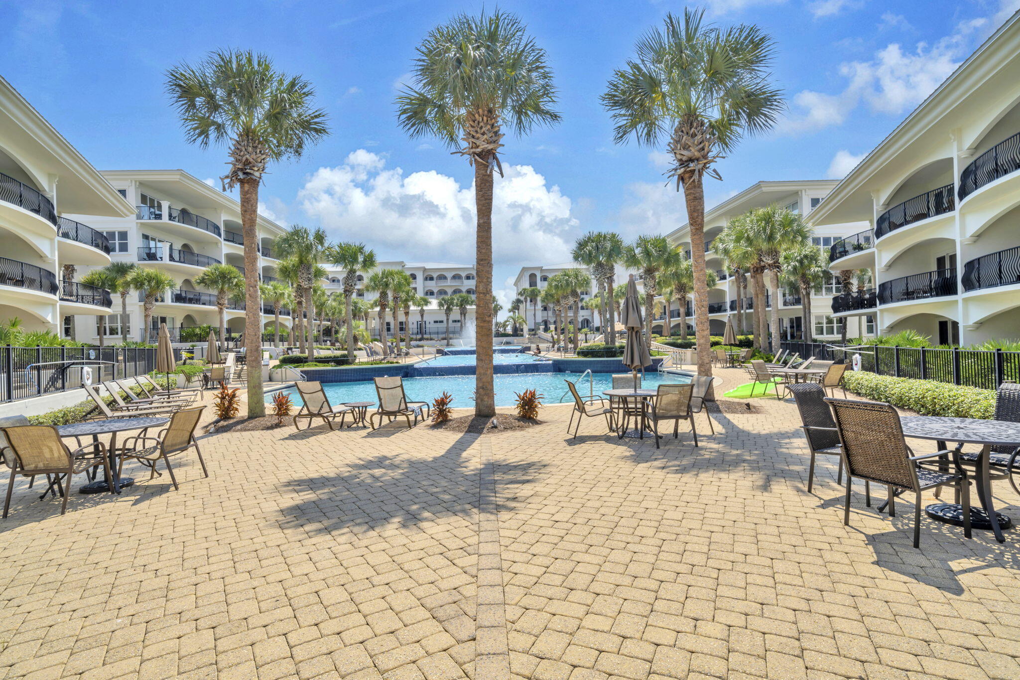 2421 West County Highway 30A, Unit F304 Santa Rosa Beach, FL 32459 - Photo 43 of 63 a view of a swimming pool with outdoor seating