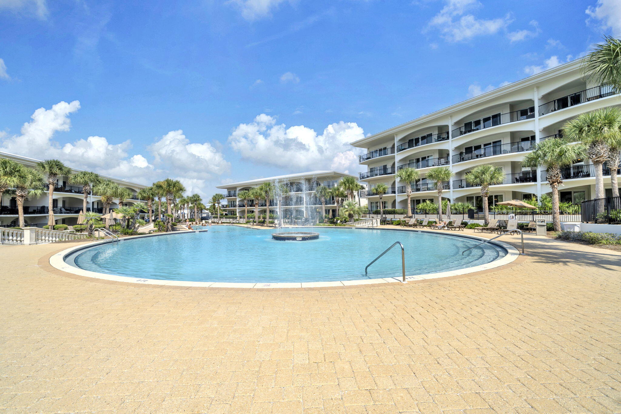 2421 West County Highway 30A, Unit F304 Santa Rosa Beach, FL 32459 - Photo 50 of 63 a view of a swimming pool and a yard