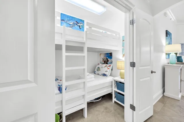 a bedroom with a bed and a cabinets