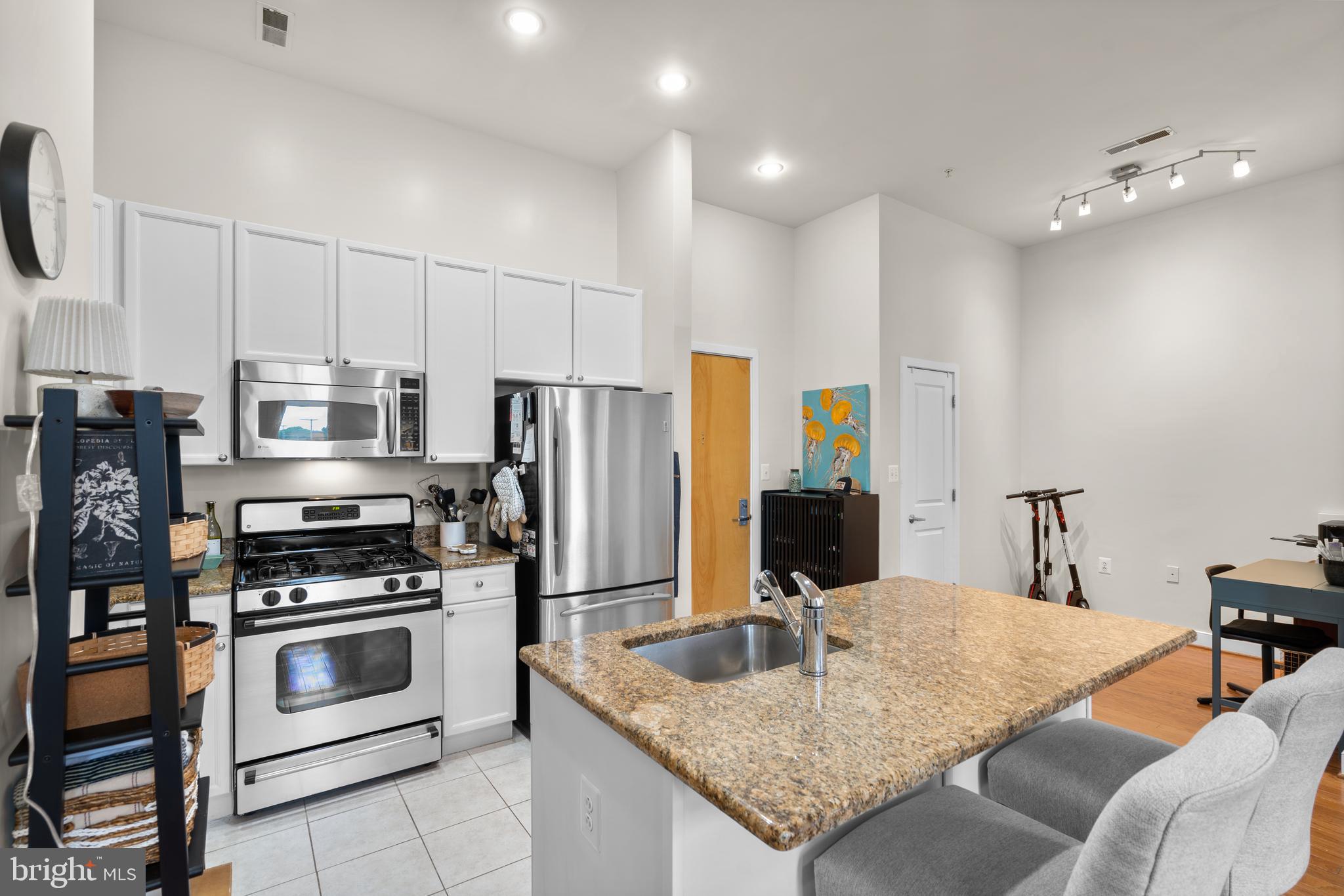 181 East Reed Avenue, Unit 412 Alexandria, VA 22305 - Photo 9 of 38 Vaulted Ceilings throughout.