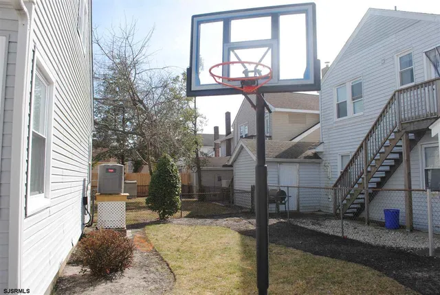 a view of a house with a street