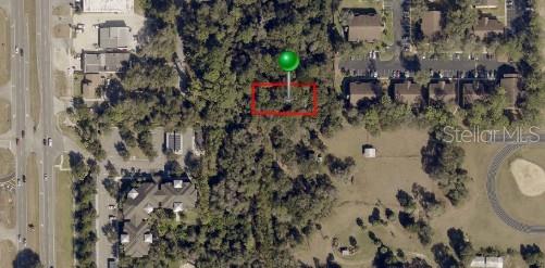 2nd Street DeLand, FL 32720 - Photo 13 of 28 a bathroom with a toilet and shower