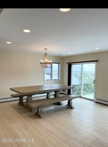 a room with gym equipment and a large window