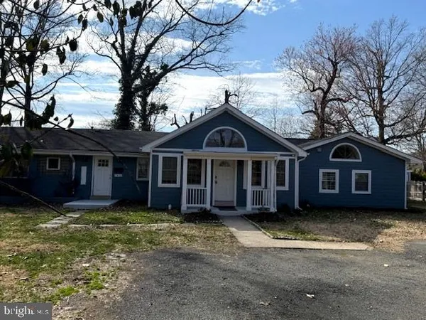 a bathroom with a toilet a sink and a bathtub
