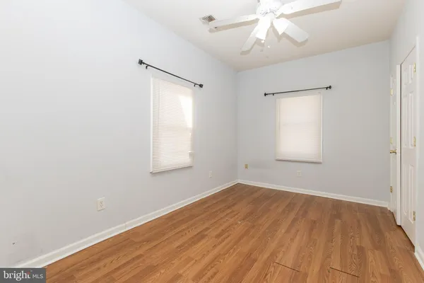 a bathroom with a sink a toilet a bath tub and a window
