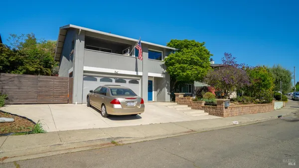 a car parked in front of a house
