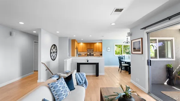 a kitchen with a stove a sink and a refrigerator