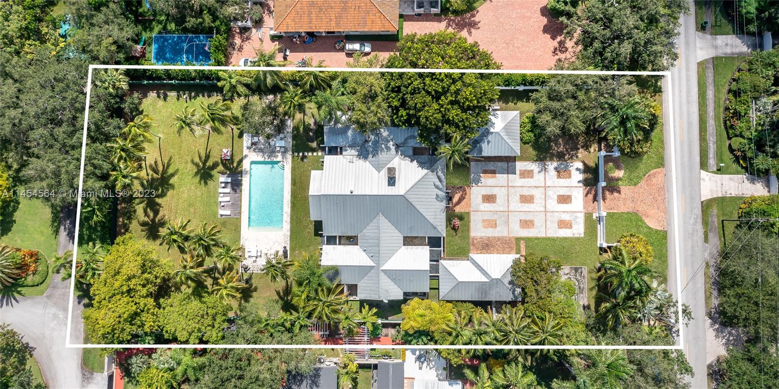 8325 School House Road Miami, FL 33143 - Photo 1 of 21 an aerial view of a house with a garden