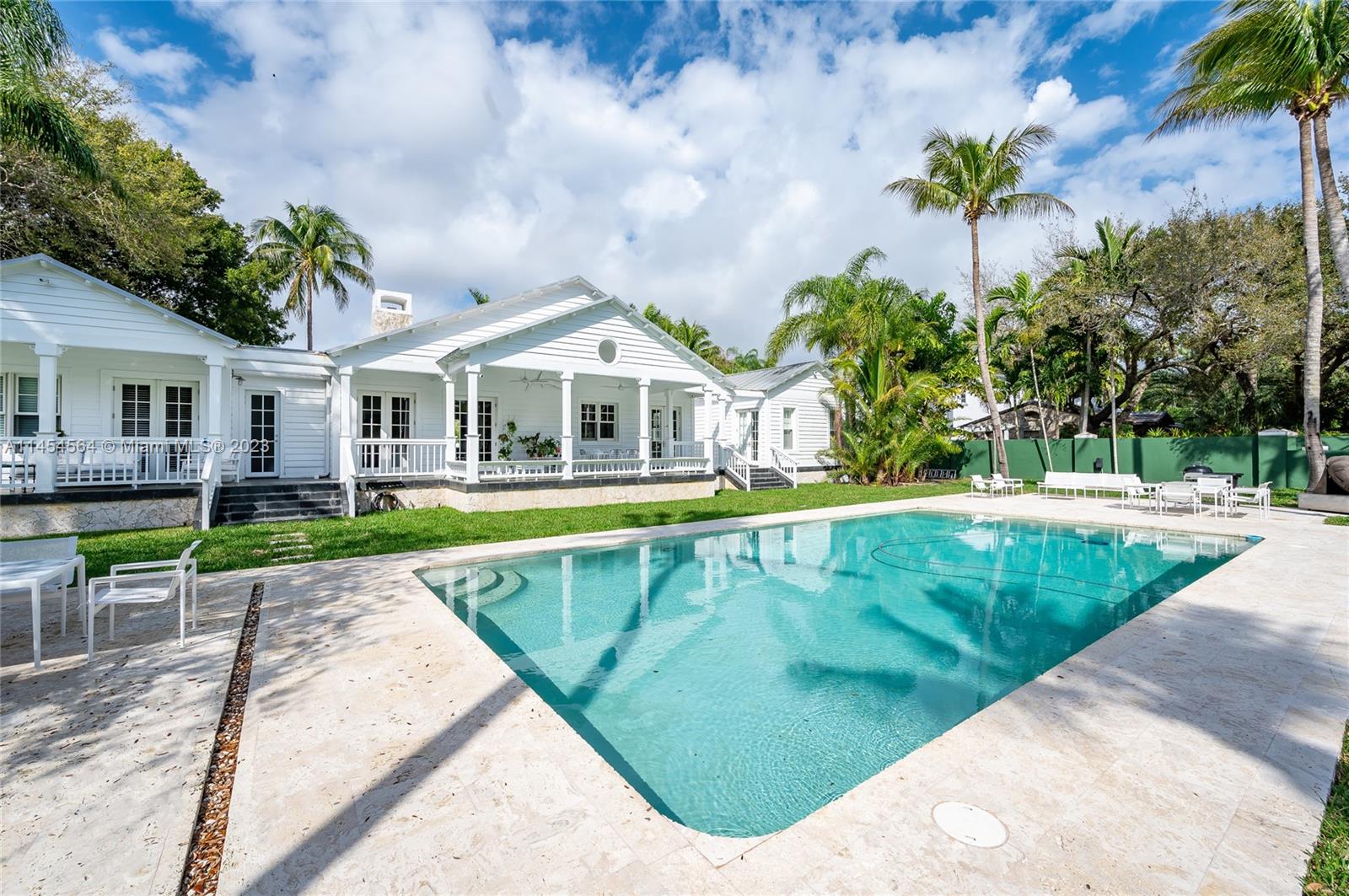 8325 School House Road Miami, FL 33143 - Photo 13 of 21 a view of a house with a swimming pool