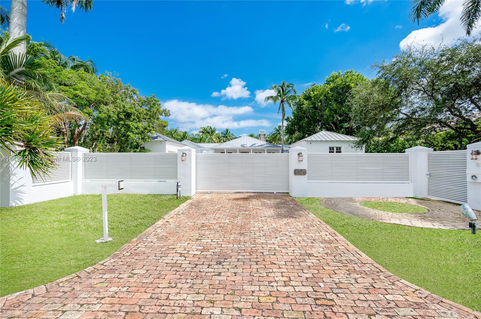 8325 School House Road Miami, FL 33143 - Photo 19 of 21 a view of backyard with swimming pool and seating area