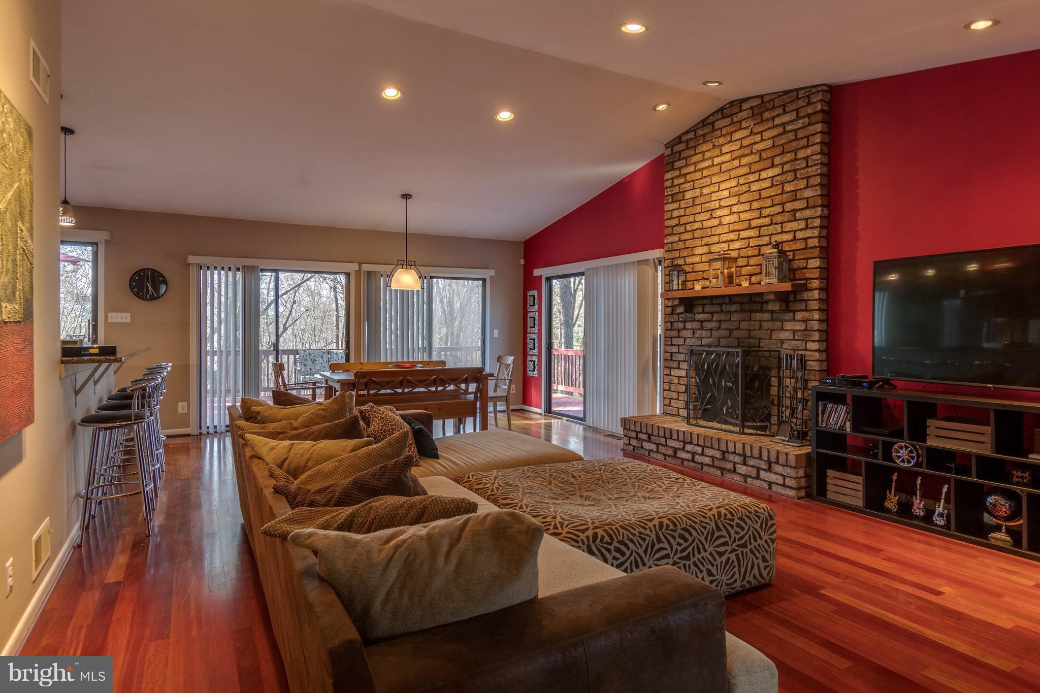 Living Room w/Fireplace #1 and glass doors to deck