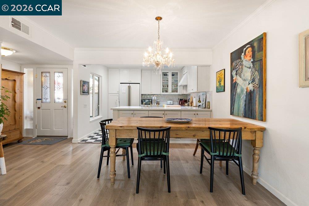 2001 Golden Rain Road, Unit 4 Walnut Creek, CA 94595 - Photo 13 of 60 a dining room with furniture and wooden floor