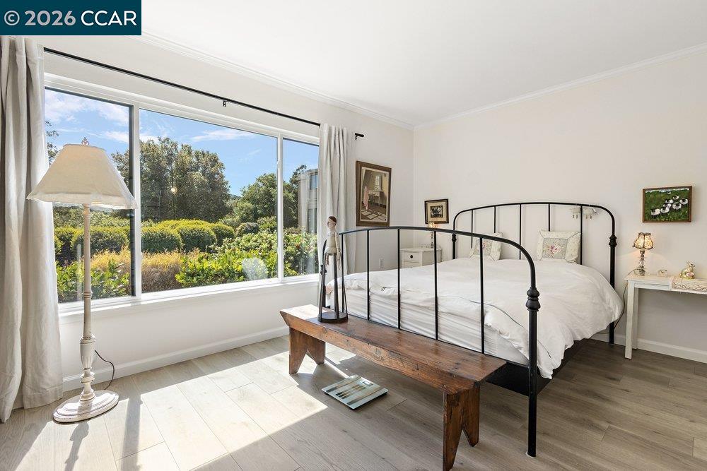 2001 Golden Rain Road, Unit 4 Walnut Creek, CA 94595 - Photo 17 of 60 a living room with furniture and a window