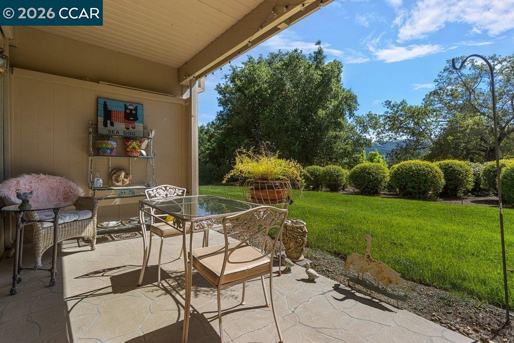 2001 Golden Rain Road, Unit 4 Walnut Creek, CA 94595 - Photo 27 of 60 a view of a chairs and table in the garden