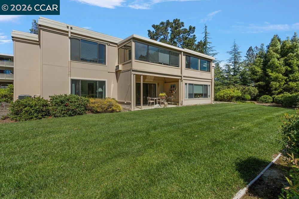 2001 Golden Rain Road, Unit 4 Walnut Creek, CA 94595 - Photo 29 of 60 a front view of a house with a yard