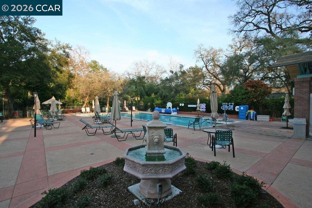 2001 Golden Rain Road, Unit 4 Walnut Creek, CA 94595 - Photo 59 of 60 a view of a patio with a table and chairs