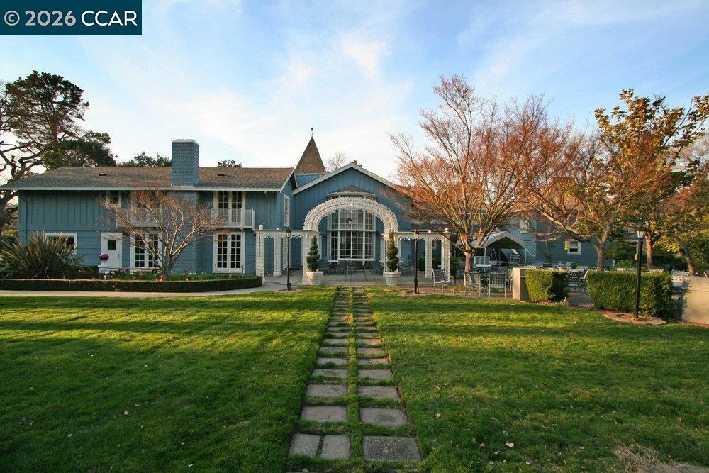 2001 Golden Rain Road, Unit 4 Walnut Creek, CA 94595 - Photo 60 of 60 a front view of a house with a yard