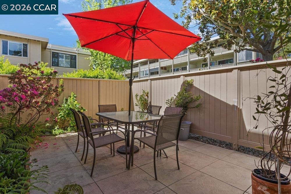 2001 Golden Rain Road, Unit 4 Walnut Creek, CA 94595 - Photo 6 of 60 a view of backyard of house with seating space