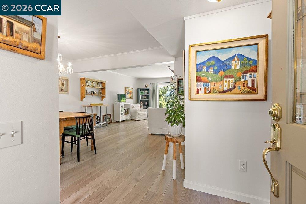 2001 Golden Rain Road, Unit 4 Walnut Creek, CA 94595 - Photo 8 of 60 an entryway with wooden floor and a rug