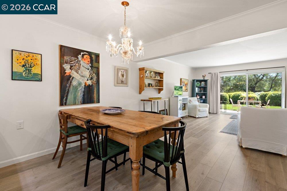 2001 Golden Rain Road, Unit 4 Walnut Creek, CA 94595 - Photo 9 of 60 a view of a dining room with furniture window and wooden floor