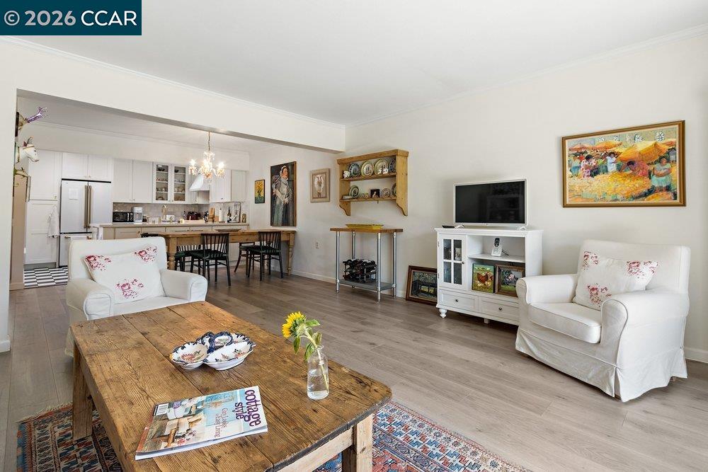2001 Golden Rain Road, Unit 4 Walnut Creek, CA 94595 - Photo 10 of 60 a living room with furniture and a flat screen tv