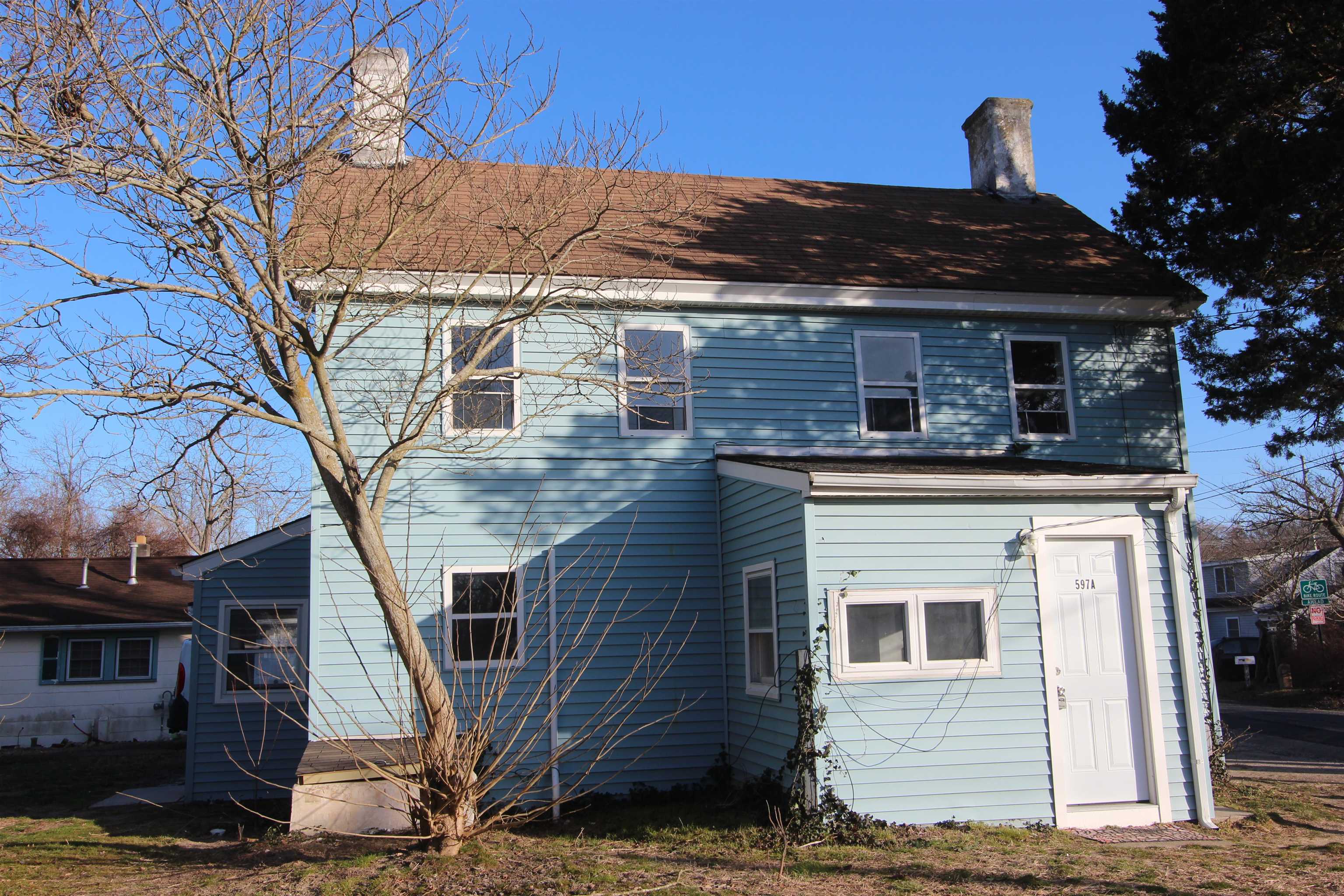 597 Seashore Road Erma, NJ 08204 - Photo 26 of 31 a front view of a house with parking space