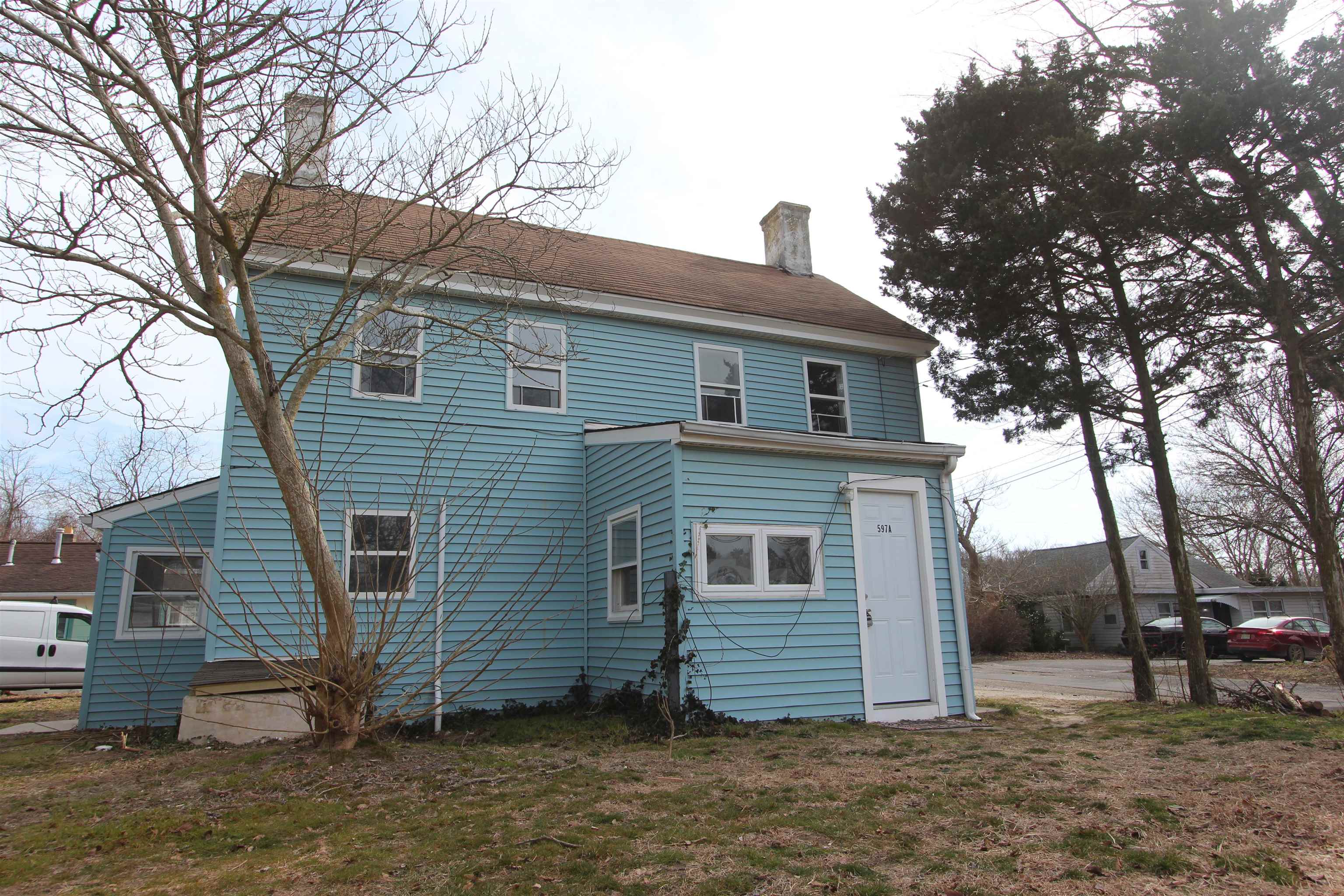 597 Seashore Road Erma, NJ 08204 - Photo 5 of 31 a view of a house with a yard