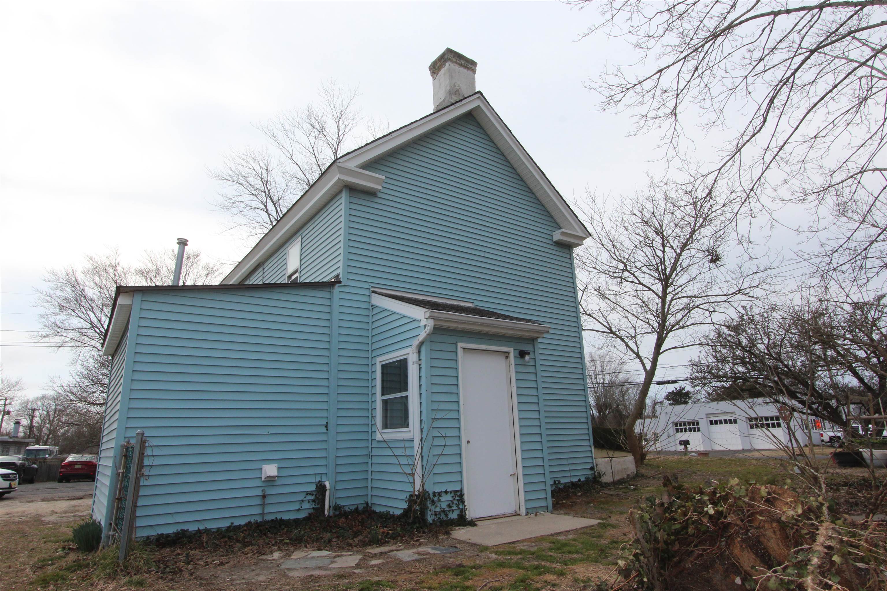 597 Seashore Road Erma, NJ 08204 - Photo 10 of 31 a view of a house with a yard