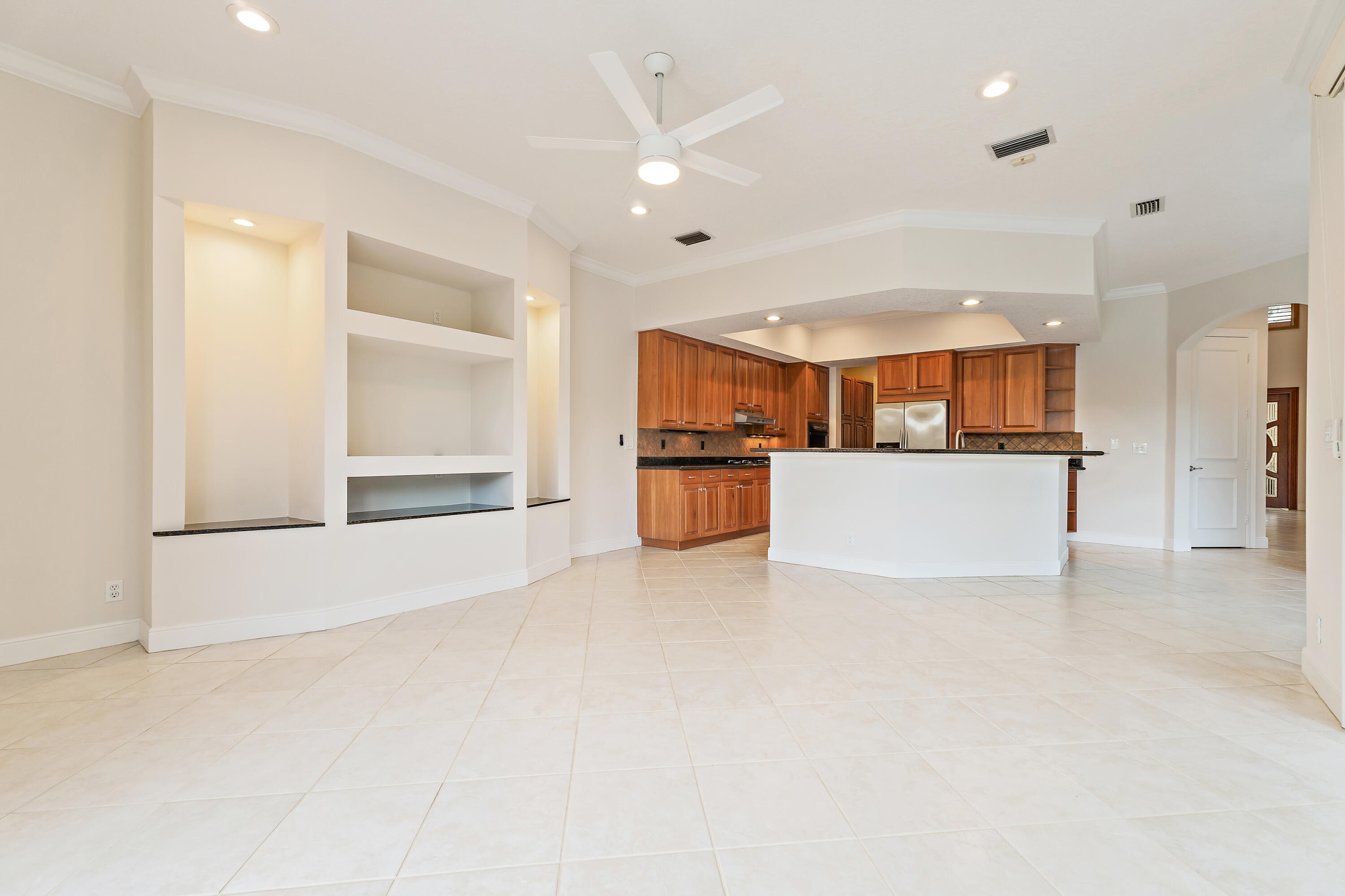 111 Fishermans Way Jupiter, FL 33477 - Photo 15 of 57 a view of a kitchen with a sink and a refrigerator