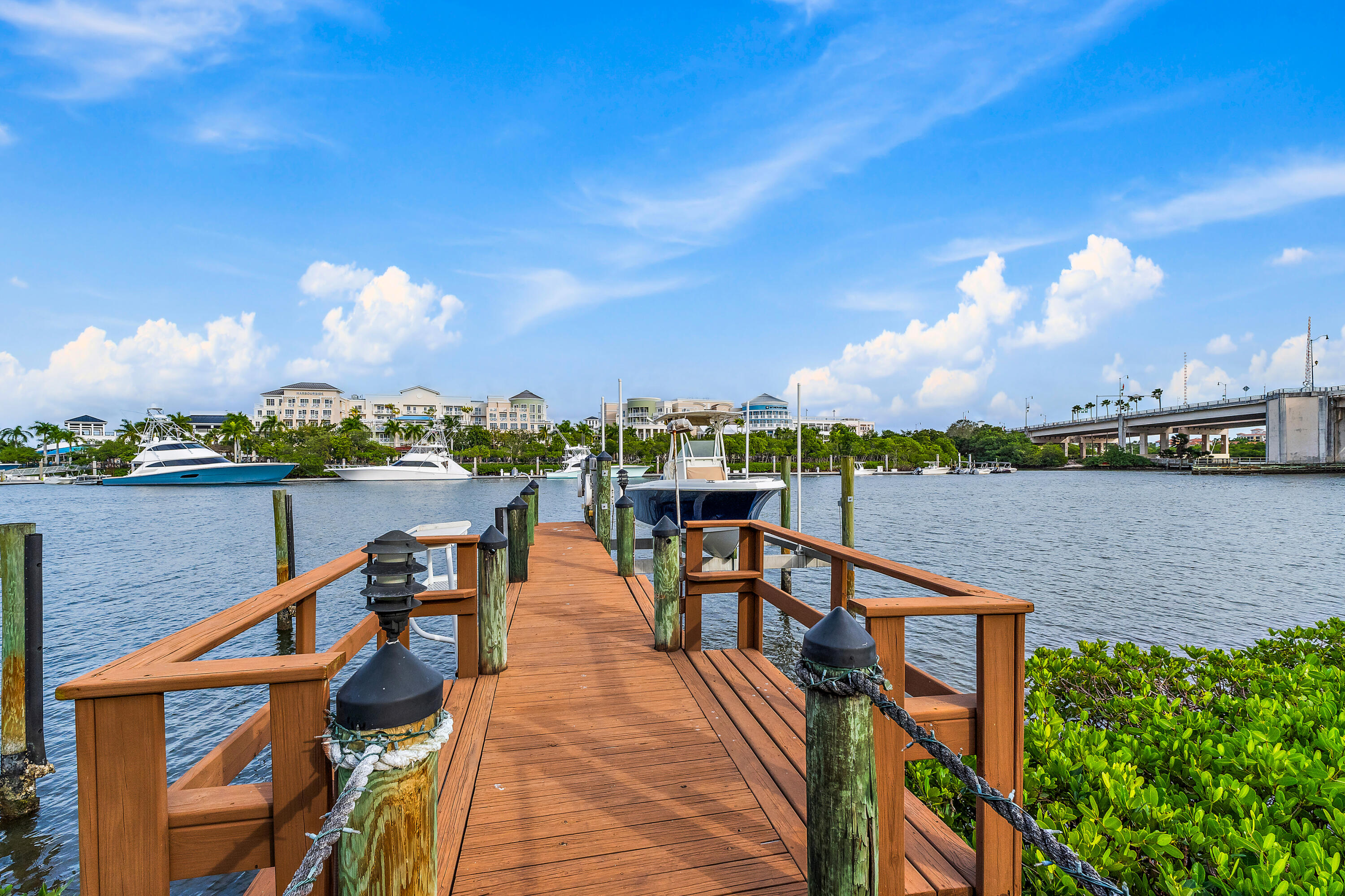 111 Fishermans Way Jupiter, FL 33477 - Photo 3 of 57 a view of swimming pool with outdoor seating and city view