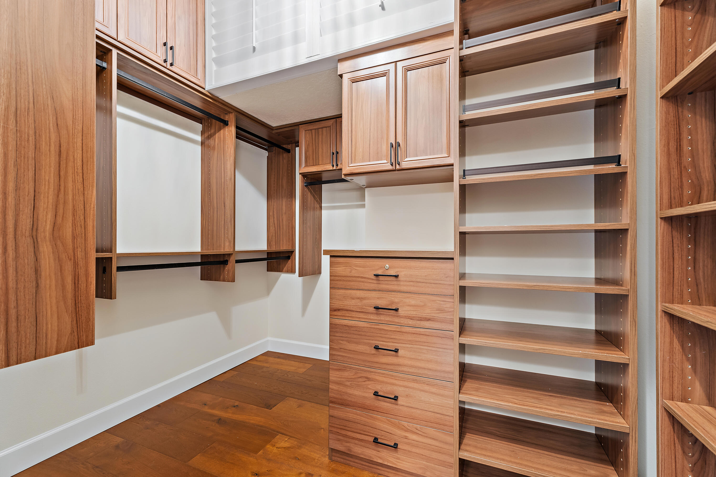 111 Fishermans Way Jupiter, FL 33477 - Photo 35 of 57 a view of walk in closet with empty racks