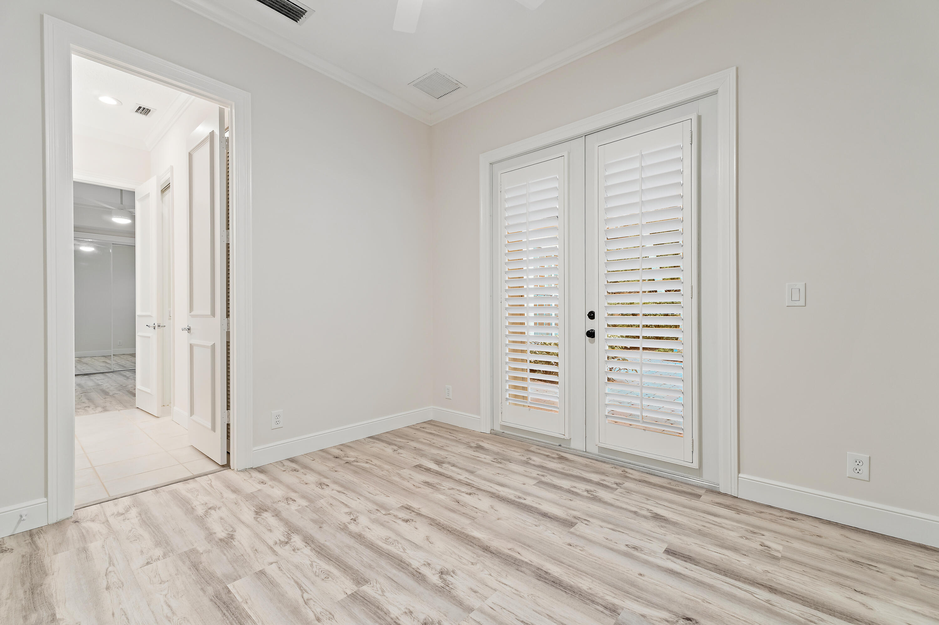 111 Fishermans Way Jupiter, FL 33477 - Photo 41 of 57 wooden floor and closet in a room