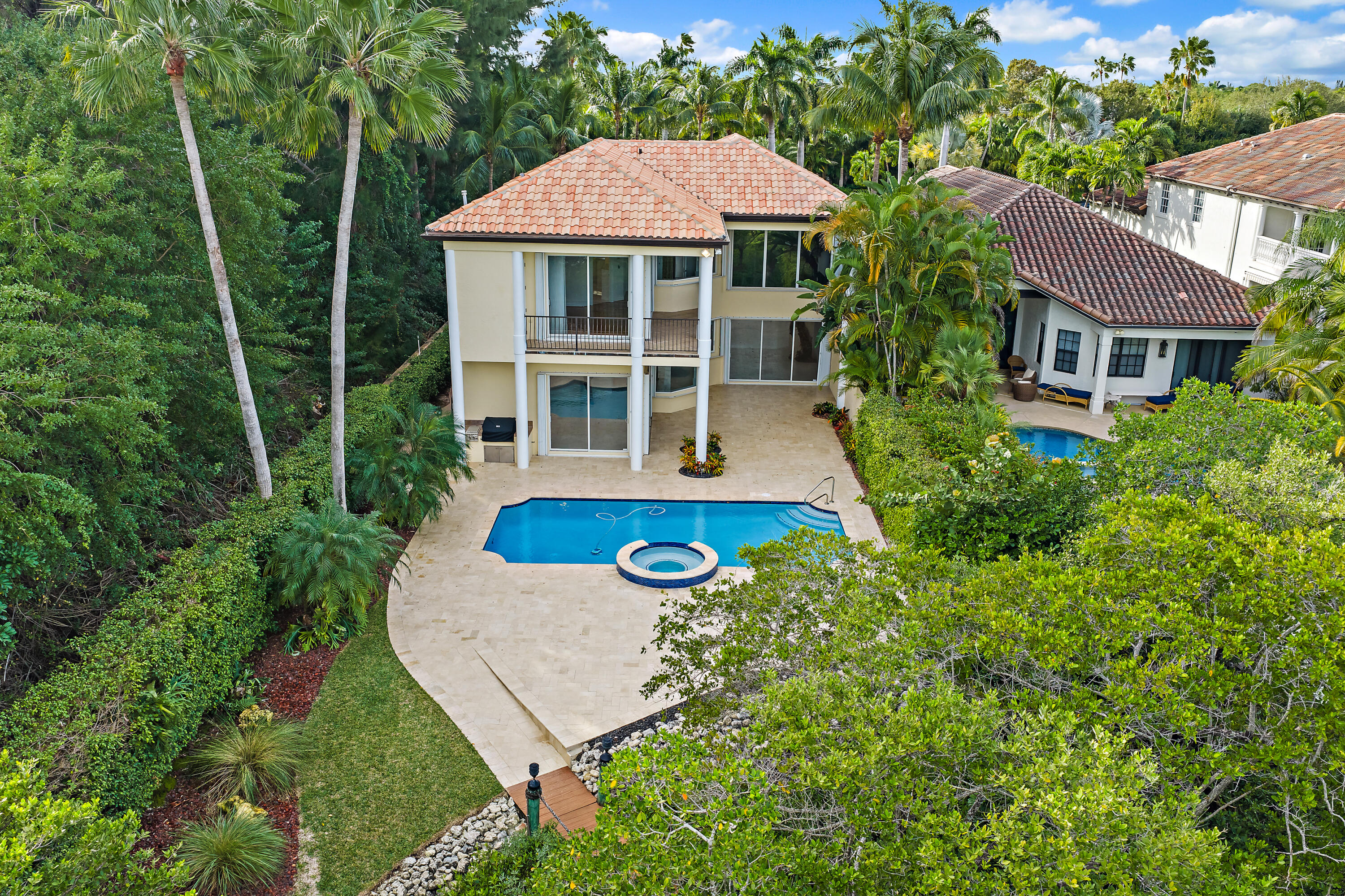 111 Fishermans Way Jupiter, FL 33477 - Photo 6 of 57 front view of a house with yard and green space