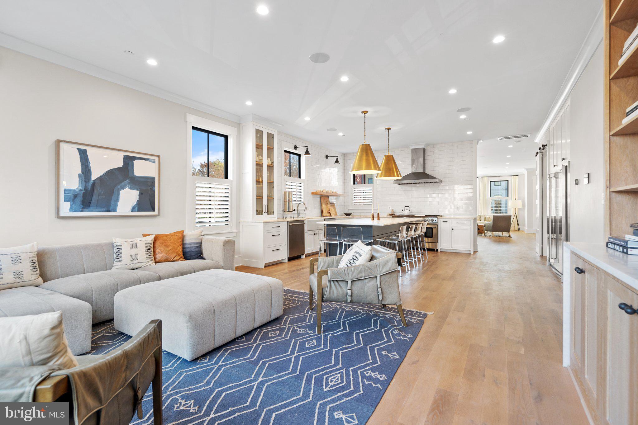 214 A Street Northeast Washington, DC 20002 - Photo 23 of 78 a living room with furniture and a table