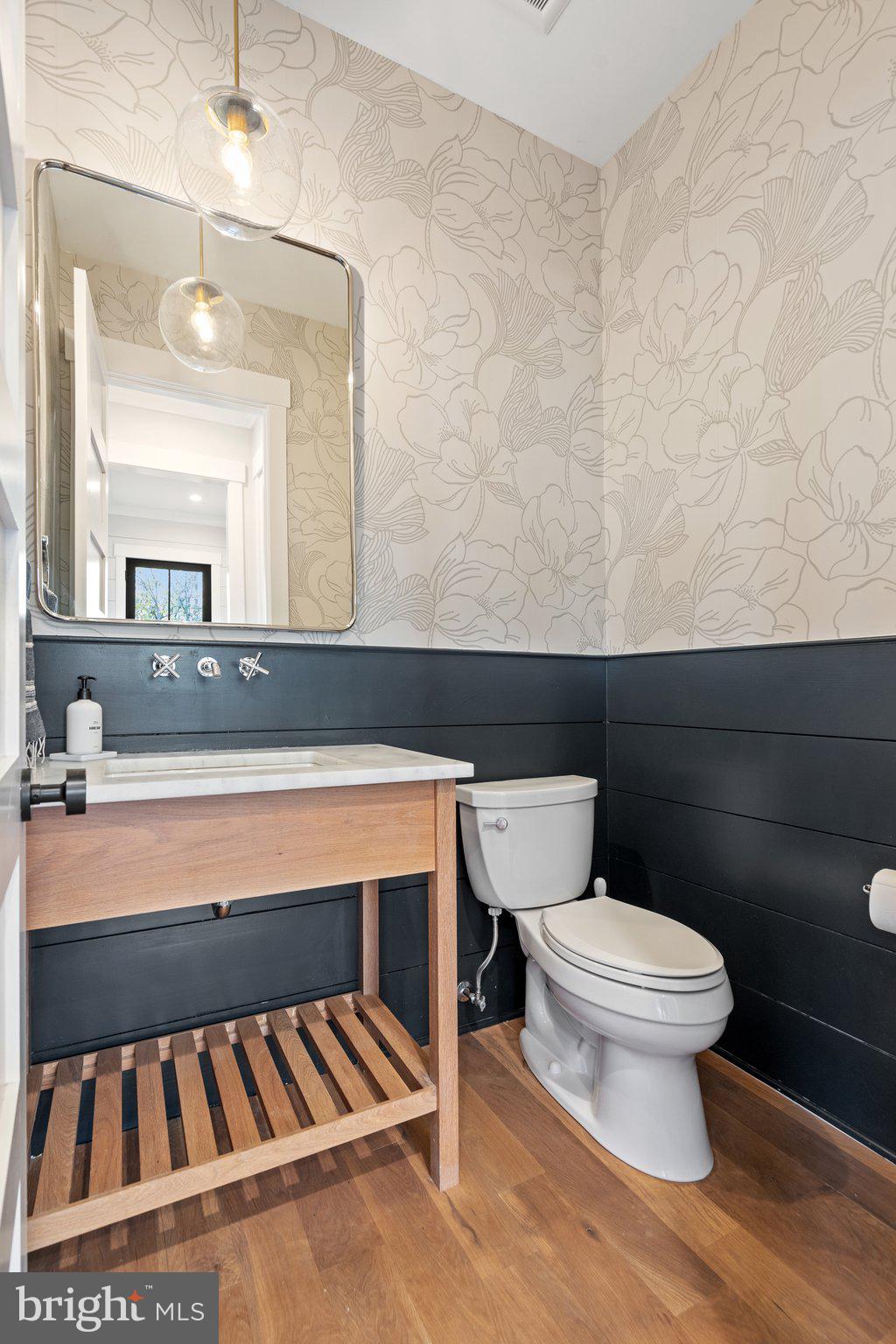 214 A Street Northeast Washington, DC 20002 - Photo 25 of 78 a bathroom with a sink and a toilet