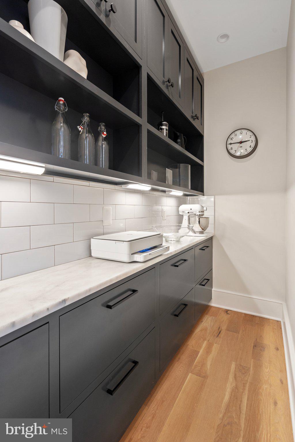 214 A Street Northeast Washington, DC 20002 - Photo 28 of 78 a bathroom with a sink and a mirror