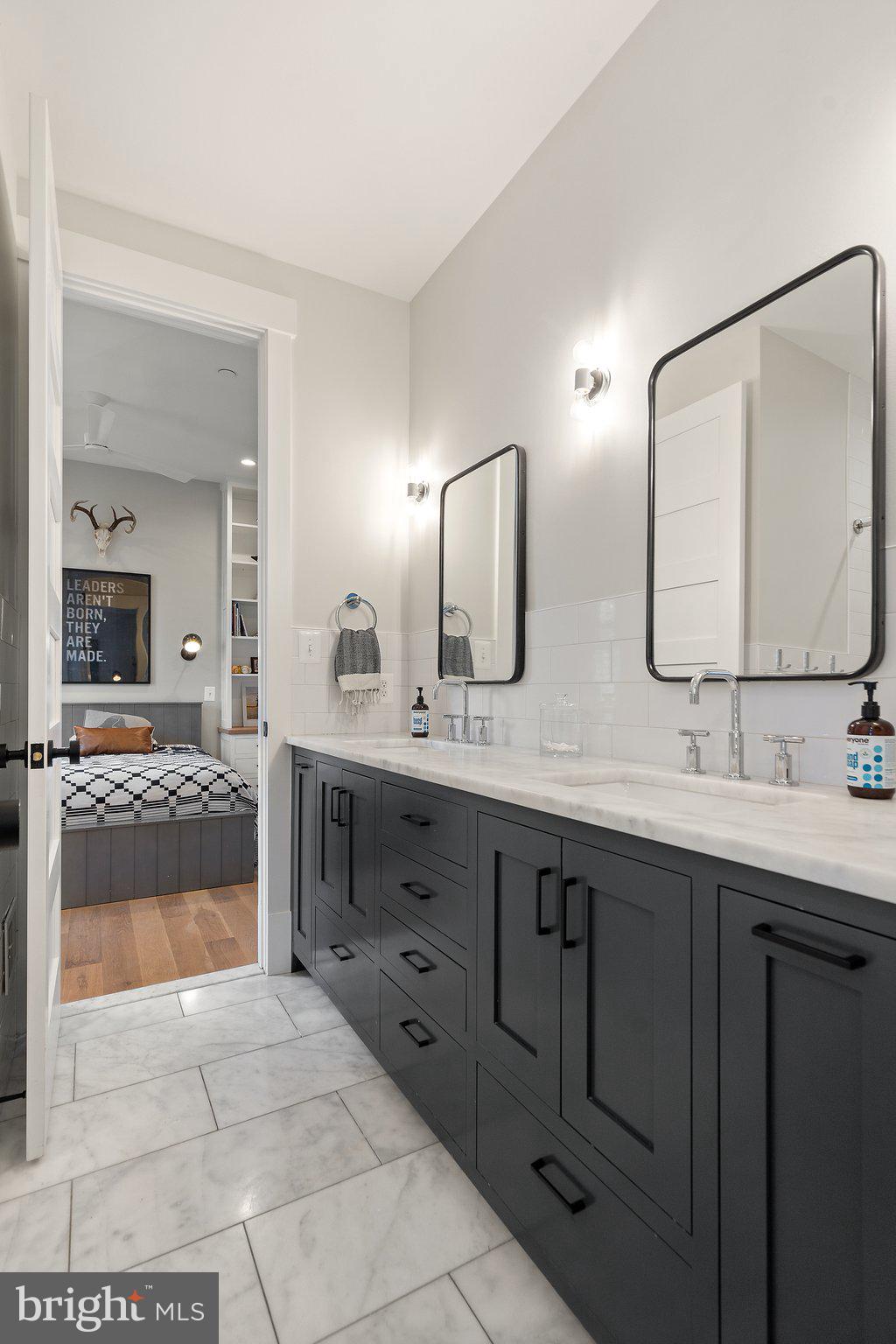 214 A Street Northeast Washington, DC 20002 - Photo 39 of 78 a spacious bathroom with a granite countertop sink mirror and bathtub