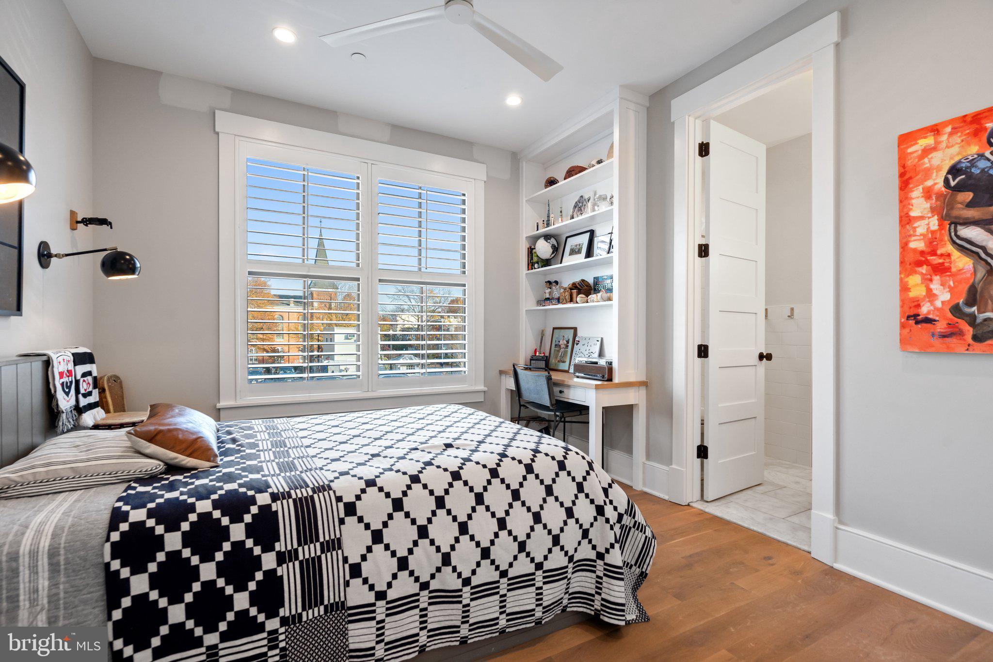214 A Street Northeast Washington, DC 20002 - Photo 41 of 78 a bedroom with a bed and a window