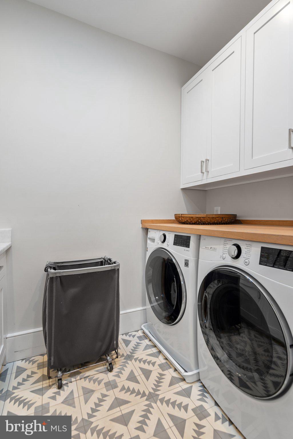 214 A Street Northeast Washington, DC 20002 - Photo 45 of 78 a view of a storage & utility room with a washer dryer