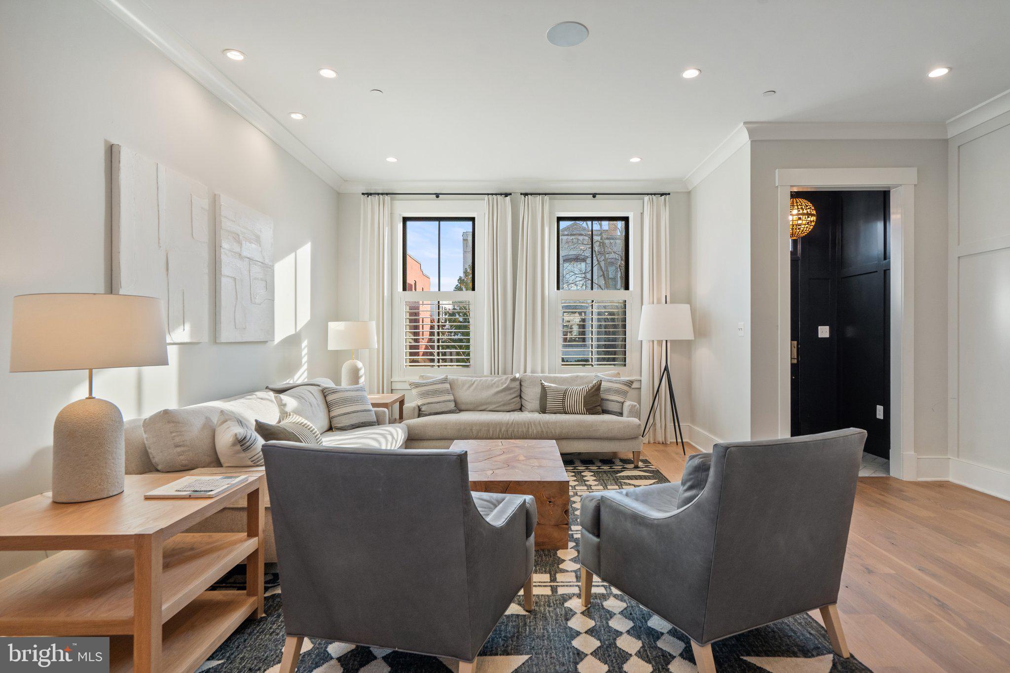 214 A Street Northeast Washington, DC 20002 - Photo 5 of 78 a living room with furniture and a large window