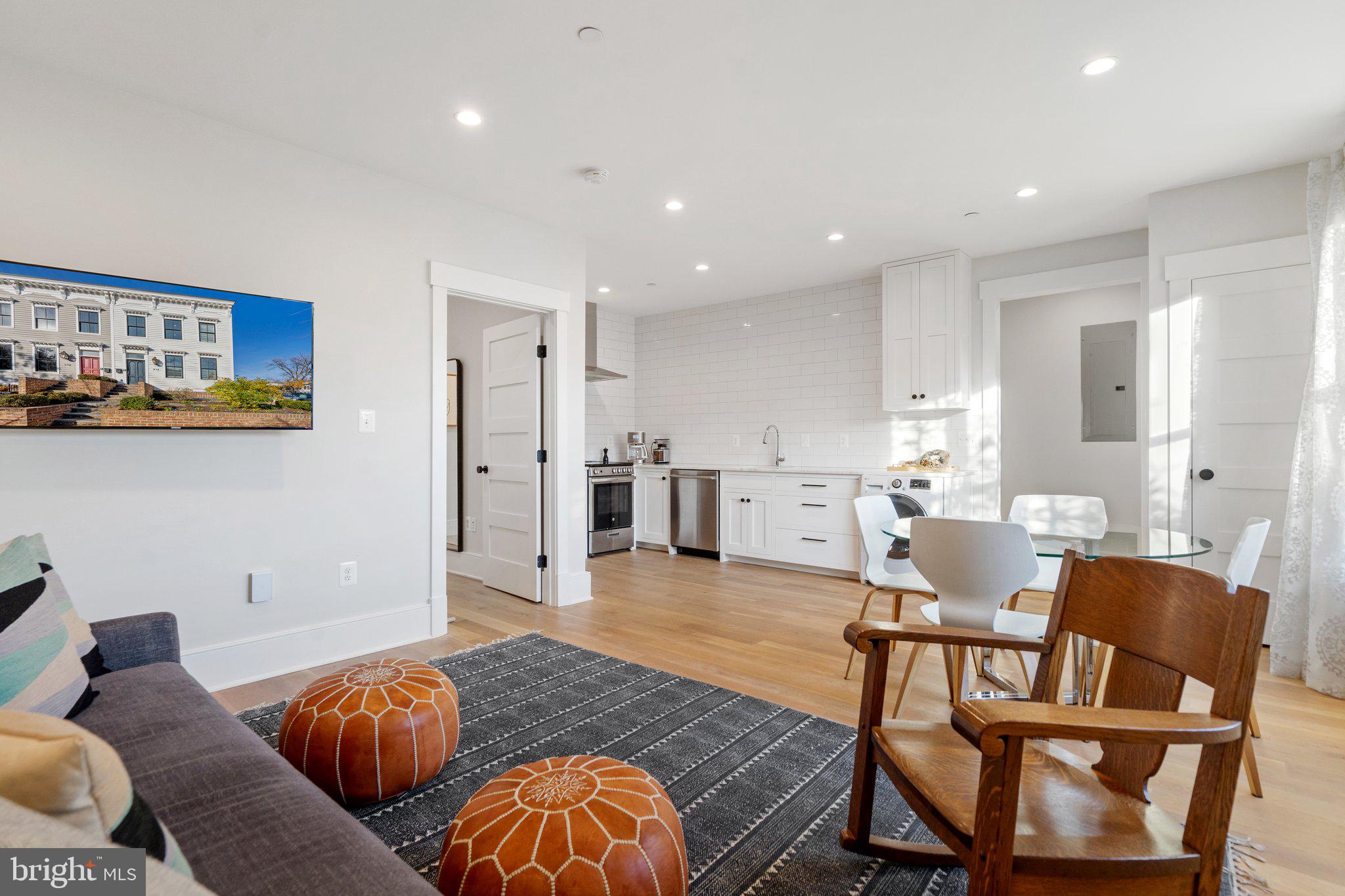 214 A Street Northeast Washington, DC 20002 - Photo 59 of 78 a living room with furniture and kitchen view