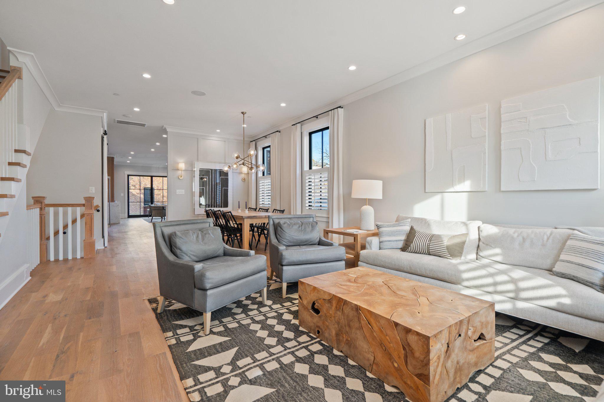 214 A Street Northeast Washington, DC 20002 - Photo 7 of 78 a living room with furniture and a couch