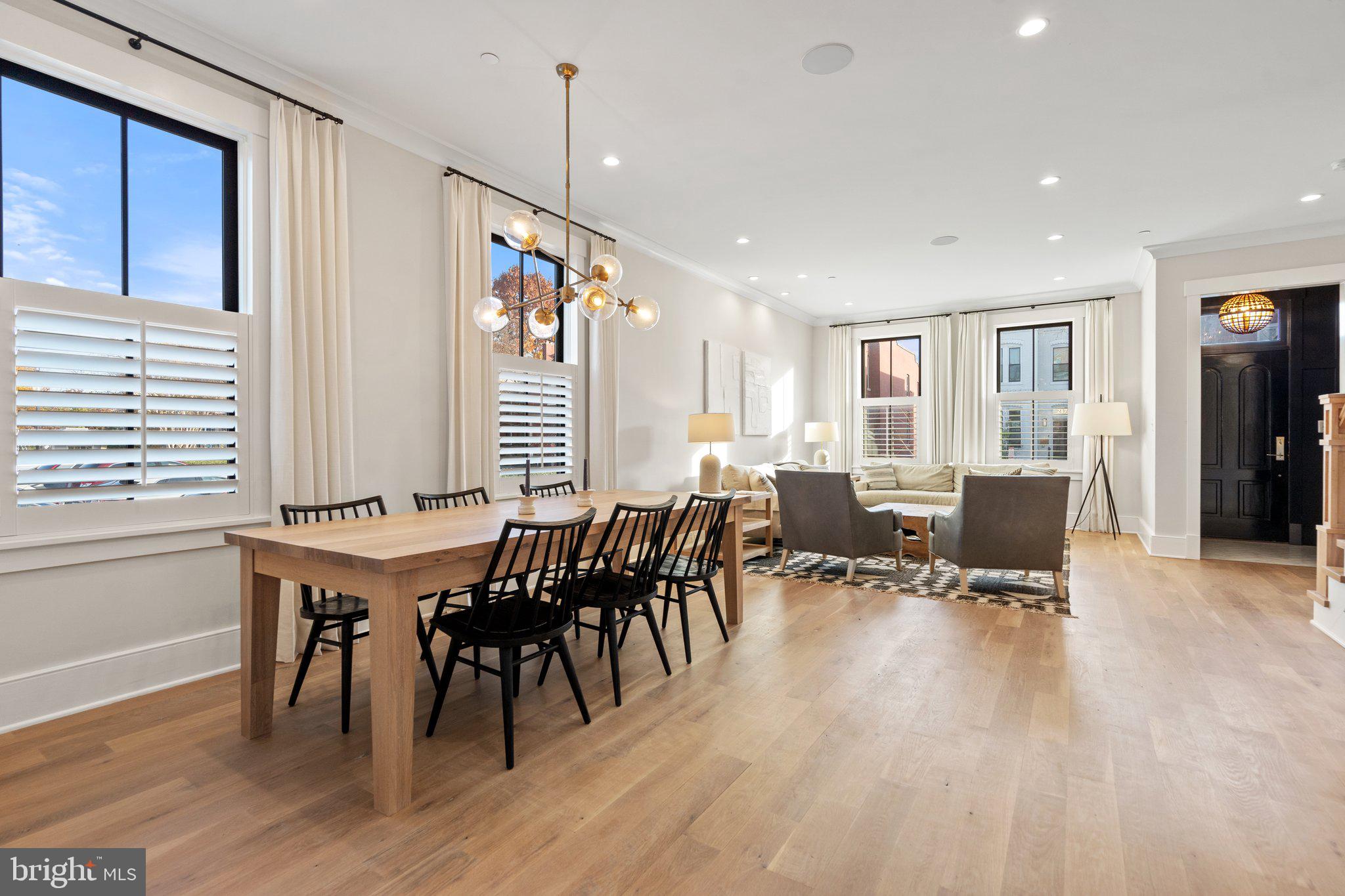 214 A Street Northeast Washington, DC 20002 - Photo 8 of 78 a view of a dining room with furniture and wooden floor