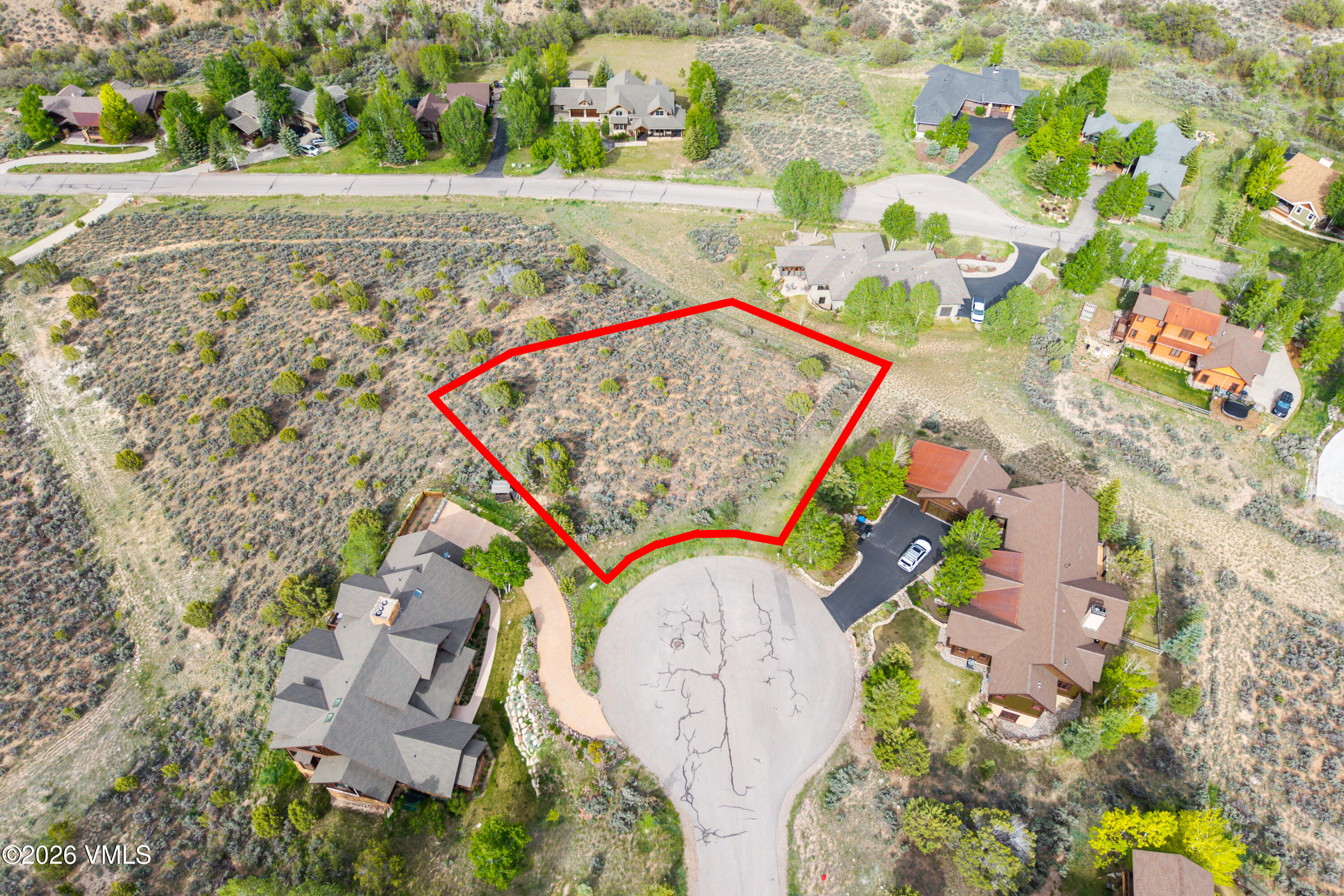 1194 Hernage Creek Road Eagle, CO 81631 - Photo 7 of 8 an aerial view of a house with a swimming pool