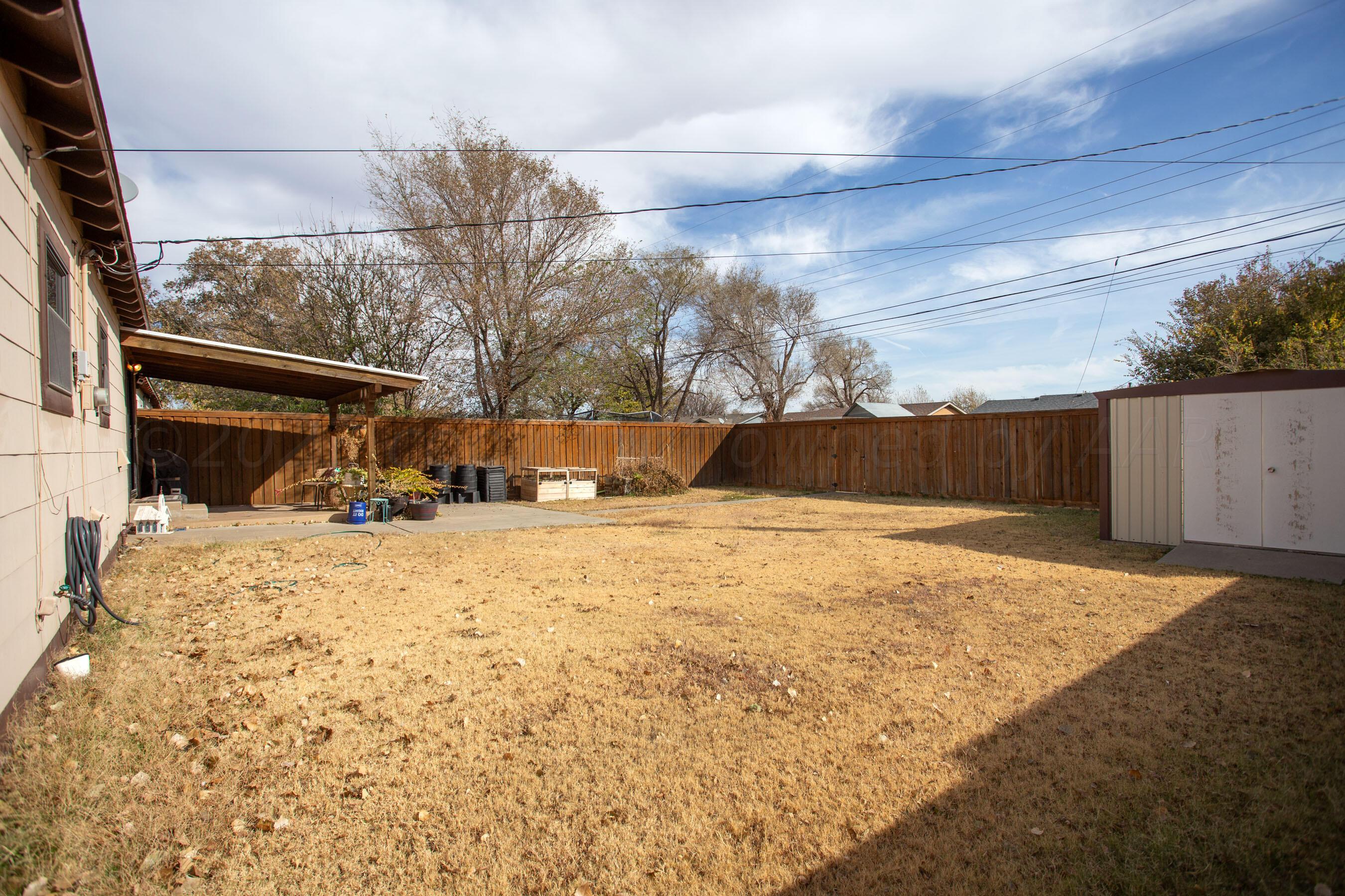 5013 South Bonham Street Amarillo, TX 79110 - Photo 26 of 27 a view of a backyard of the house