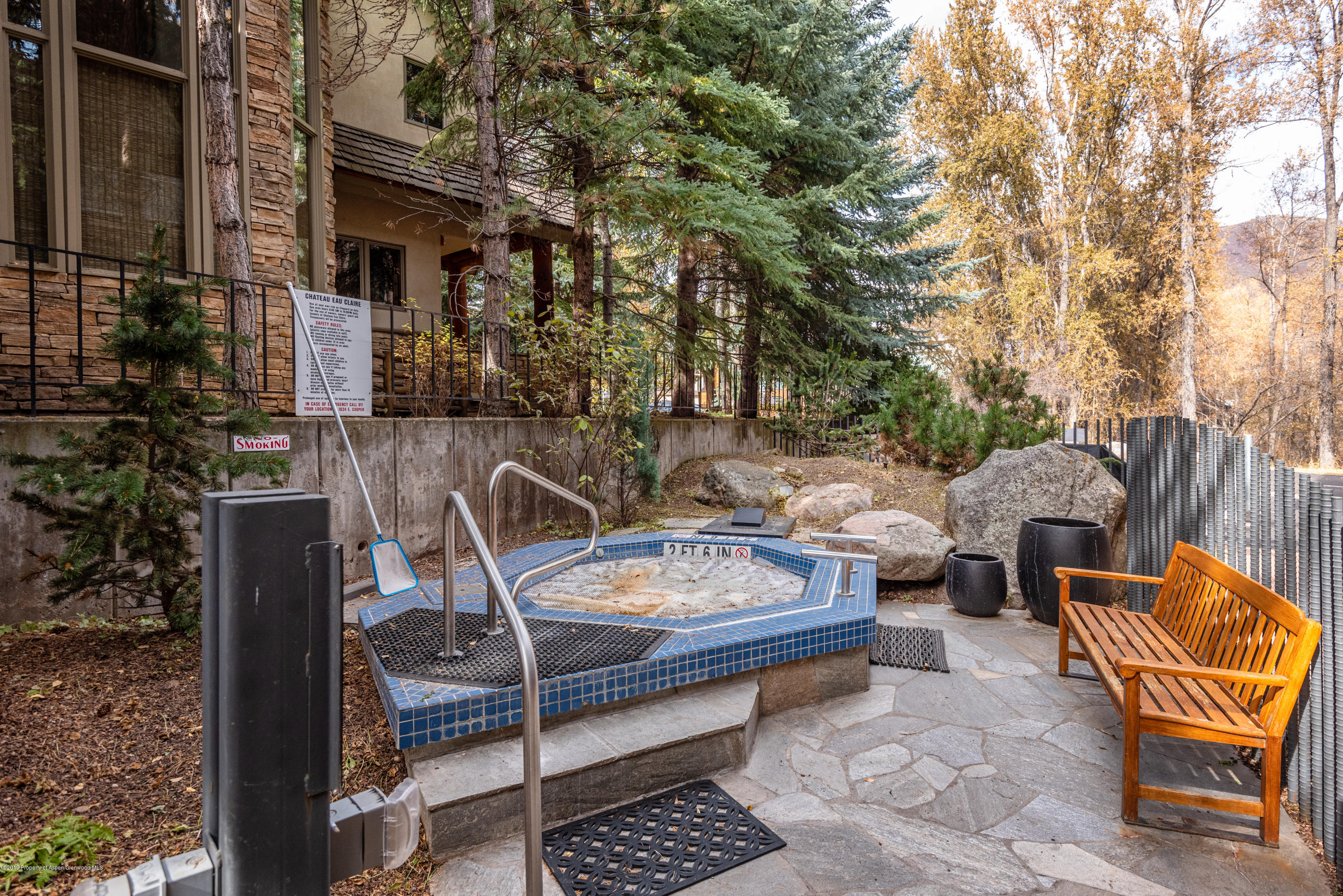 1034 East Cooper Avenue, Unit 5A Aspen, CO 81611 - Photo 12 of 15 a view of backyard with outdoor seating