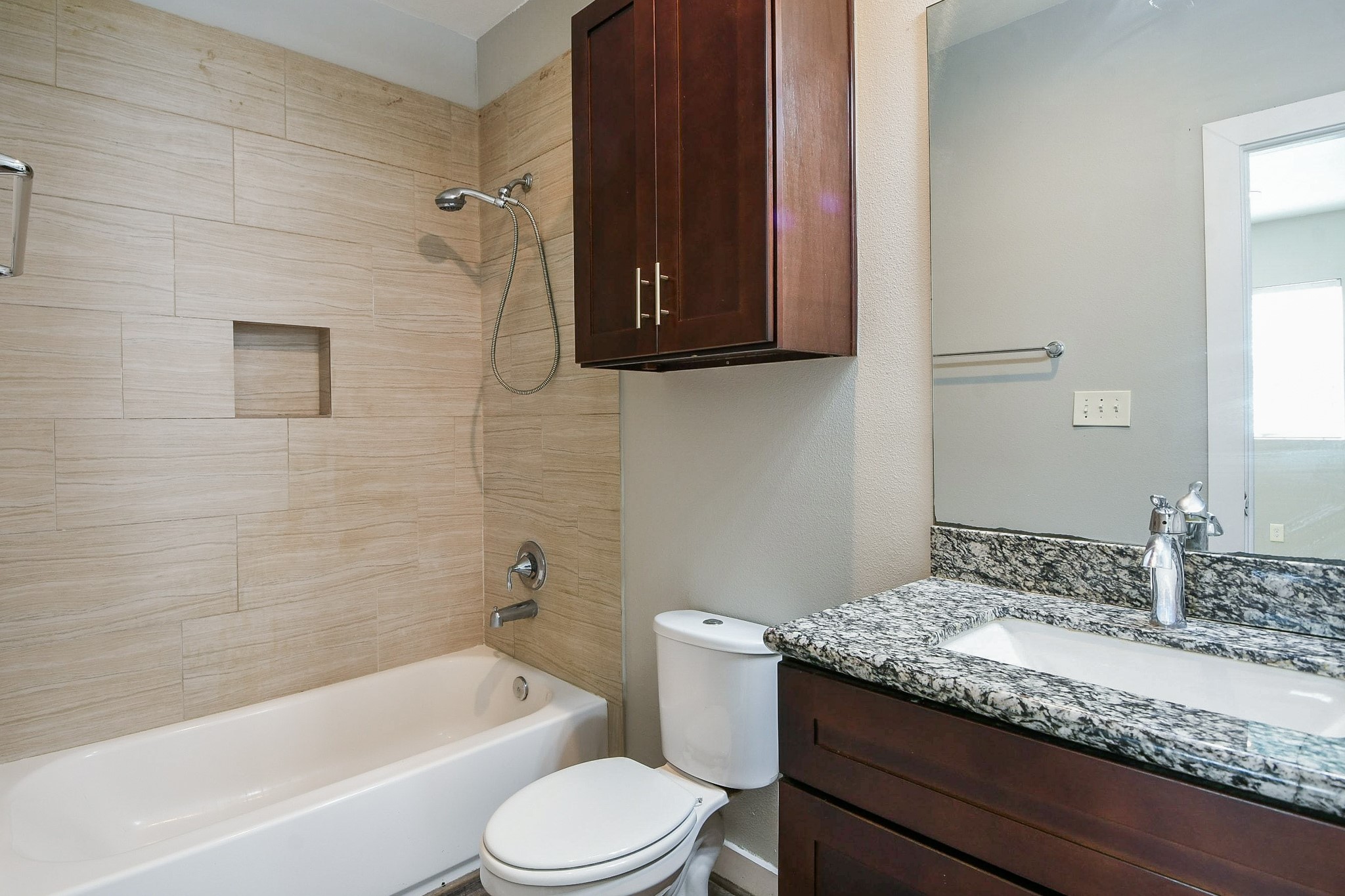 3249 Dixie Drive, Unit B Houston, TX 77021 - Photo 12 of 25 a bathroom with a granite countertop sink toilet and shower
