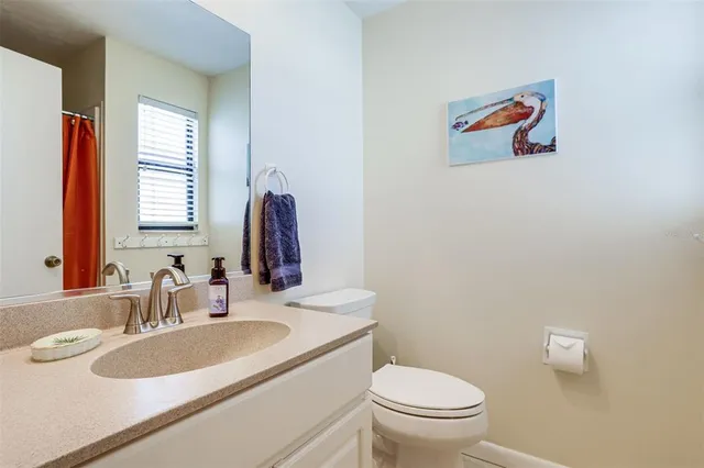 a view of a bedroom with washer and dryer
