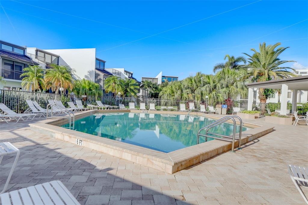 2955 North Beach Road, Unit A432 Englewood, FL 34223 - Photo 23 of 24 a view of a swimming pool with a patio